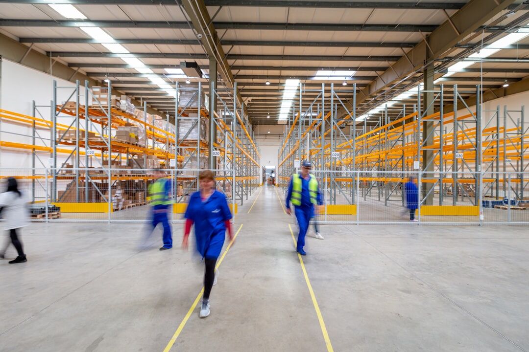 Warehouse workers coordinating logistics