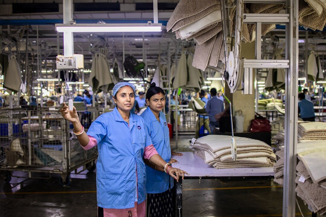 Engineers reviewing industrial process in a factory